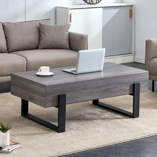 A Rustic Gray Wood Grain MDF Coffee Table With Black Metal Legs - An Elegant Space In Natural Wood Tones